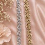 Add a luxurious finishing touch to your ethnic and designer outfits with the Zexira Golden & Silver Combo Kinari 36 Meter Lace. This premium combo pack includes 36 meters of elegant kinari lace (18 meters Golden + 18 meters Silver), making it an ideal choice for fashion designers, boutiques, tailors, resellers, and DIY craft enthusiasts. The beautiful metallic finish and intricate zari-inspired design create a rich, festive look that enhances every garment with elegance and style. Combo kinari lace is widely used for traditional Indian wear because of its versatility and timeless appeal. Crafted with quality materials, this decorative lace is lightweight, durable, and easy to stitch or glue onto fabrics. The shimmering gold and silver colors complement a wide range of outfits, allowing you to mix and match according to your design needs. Whether you're creating festive attire or upgrading everyday ethnic wear, this lace delivers a professional and premium finish. Perfect for decorating saree borders, dupattas, lehengas, kurtis, salwar suits, blouses, gowns, sherwanis, jackets, potlis, cushions, table runners, torans, gift wrapping, and various home décor or DIY craft projects. It is also an excellent choice for wedding wear, festive collections, Navratri, Diwali, Eid, bridal outfits, stage costumes, dance dresses, and boutique tailoring. Product Features Brand: Zexira Product: Golden & Silver Combo Kinari Lace Total Length: 36 Meters (18M Golden + 18M Silver) Color: Golden & Silver Material: Premium Decorative Kinari Lace Finish: Elegant Metallic Shine Easy to Stitch: Suitable for machine and hand sewing Reusable & Durable: Long-lasting quality for multiple projects Enhance every creation with a touch of elegance using the Zexira Golden & Silver Combo Kinari 36 Meter Lace—the perfect combination of premium quality, attractive design, and exceptional value for fashion and craft applications. Inspired by the decorative kinari and zari trims commonly used in ethnic apparel, this combo offers both versatility and a refined finish for creative projects.