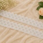 Enhance the beauty of your ethnic and designer outfits with the elegant Zexira White Cotton Cut Work Border Lace. Crafted from premium-quality cotton material, this beautiful lace features an intricate cut work pattern that adds a sophisticated and stylish touch to any garment. With a generous length of 10 meters and a width of 2 inches, it is perfect for multiple sewing, tailoring, and decorative projects. The classic white color complements a wide range of fabrics and outfits, making it an ideal choice for kurtis, suits, dupattas, sarees, lehengas, blouses, gowns, and Pakistani dresses. The delicate cut work design creates a graceful and premium look, making your outfits stand out during festivals, weddings, parties, and special occasions. Made with high-quality cotton, this border lace is soft, durable, lightweight, and easy to stitch. It can also be used for DIY craft projects, home décor accents, gift wrapping, and fashion accessories. Whether you are a designer, boutique owner, or fashion enthusiast, this versatile lace is a perfect addition to your collection. Product Details: Brand: Zexira Color: White Material: Cotton Design: Cut Work Border Lace Length: 10 Meter Width: 2 Inch Soft, Durable & Easy to Stitch Suitable for Suits, Dupattas, Sarees, Blouses, Kurtis, Lehengas, Gowns & Craft Decoration Add a touch of elegance and timeless charm to your creations with the premium-quality Zexira White Cotton Cut Work Border Lace. Inspired by traditional cutwork lace styling commonly used for dress, saree, and decorative borders.